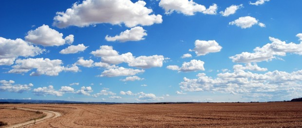 blue sky with clouds over desert